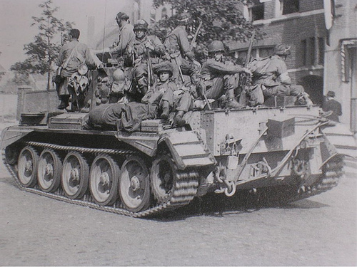 U.S 101st Screaming Eagles Paratroopers hitch a ride on a Irish Guards Cromwell tank. Operation Market garden - Holland.jpg