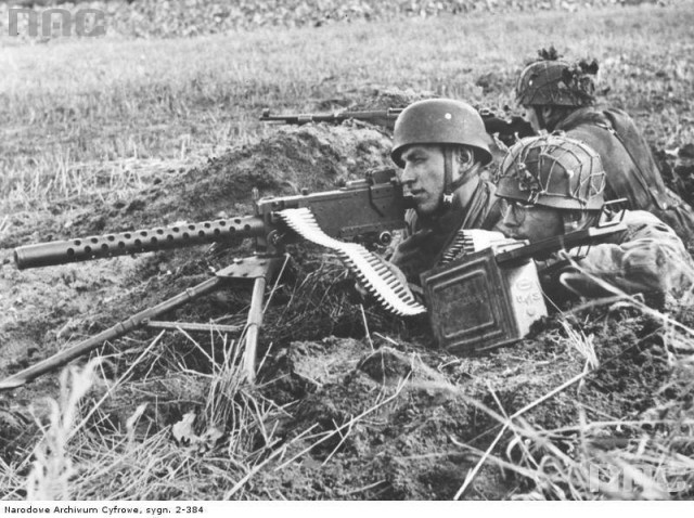 German paratroopers firing a captured U.S. M1919A4 Browning machine gun..jpg